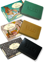 Load image into Gallery viewer, Anuspa Khadi Shahi &amp; Scrub Combo - Shahi Khus [Vetiver], Shahi Sandal and Charcoal Herbal Soaps  125gms each (Pack of 3)
